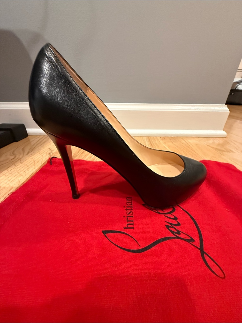 Christian Louboutin Black Leather Stiletto Pump with Signature Red Sole